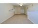 Spacious bonus room with neutral carpet, ceiling fan, and closet at 39100 Tacoma Dr, Lady Lake, FL 32159
