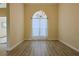 Elegant dining room features modern flooring, bright walls and a decorative chandelier at 39100 Tacoma Dr, Lady Lake, FL 32159