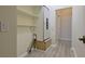 Hallway with utility closet and access to additional rooms at 39100 Tacoma Dr, Lady Lake, FL 32159