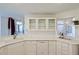 Kitchen featuring white cabinets, quartz countertops, and stainless steel appliances at 39100 Tacoma Dr, Lady Lake, FL 32159