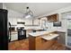 Bright kitchen with modern appliances and tile flooring at 40619 W 3Rd Ave, Umatilla, FL 32784
