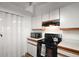 Functional kitchen with appliances, including a microwave and range at 40619 W 3Rd Ave, Umatilla, FL 32784