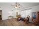 Inviting living room featuring hard wood floors and natural light at 40619 W 3Rd Ave, Umatilla, FL 32784