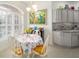Cozy breakfast nook with large windows and natural light at 447 Simpson St, The Villages, FL 32162