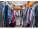 Walk-in closet with wire racking for clothing and storage, and carpeted floors at 447 Simpson St, The Villages, FL 32162