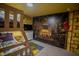 The bedroom has a bunk bed and a wall mural of a castle, with a magical themed rug at 4836 Romeo Cir, Kissimmee, FL 34746