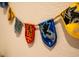 Close up of Hogwarts house themed banners hanging on a wall at 4836 Romeo Cir, Kissimmee, FL 34746