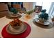 Elegantly decorated dining table, perfect for intimate gatherings and special occasions at 4836 Romeo Cir, Kissimmee, FL 34746