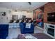 Open floor plan with a modern kitchen and a beautifully decorated living room at 4836 Romeo Cir, Kissimmee, FL 34746