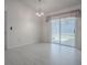 Bright dining room features neutral walls and sliding glass doors to the lanai at 485 Pixie Ln, The Villages, FL 32162