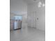 Kitchen featuring stainless steel appliances and bright neutral walls at 485 Pixie Ln, The Villages, FL 32162