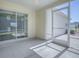 Enclosed patio with a view of the backyard at 485 Pixie Ln, The Villages, FL 32162