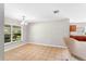 Dining room with tile floors, light fixture, and large window at 519 Hearthglen Blvd, Winter Garden, FL 34787