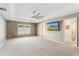 Large main bedroom with a ceiling fan and carpeted floors at 519 Hearthglen Blvd, Winter Garden, FL 34787