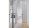 Mirrored closet door shows bath tub and sink in the bathroom at 54 Camino Real Blvd # 504, Howey In The Hills, FL 34737