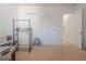 A bright room has a fan on the floor and a closet in a home at 54 Camino Real Blvd # 504, Howey In The Hills, FL 34737