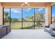 Relaxing screened-in lanai offering panoramic views at 54 Camino Real Blvd # 504, Howey In The Hills, FL 34737
