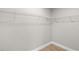 A well-organized walk-in closet with ample wire shelving for storage and organization at 565 Malauka Radl, Ocklawaha, FL 32179
