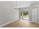 Dining Room with sliding door and closet at 565 Malauka Radl, Ocklawaha, FL 32179