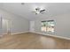 Living Room with ceiling fan and large windows at 565 Malauka Radl, Ocklawaha, FL 32179