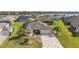 Aerial view of the home showcasing its lush landscaping and the community surroundings at 712 Krietemeyer Path, The Villages, FL 32163