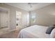 Comfortable bedroom features a closet and a window that offers natural light at 712 Krietemeyer Path, The Villages, FL 32163