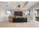 Stylish living room with decorative wall art, a modern ceiling fan, and comfortable seating at 712 Krietemeyer Path, The Villages, FL 32163