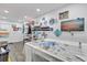 Finished basement featuring ample shelving and storage space, creating an organized and versatile area at 73 Bay Dr, Ocklawaha, FL 32179