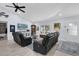 Well-lit living room with comfortable seating and stylish decor at 73 Bay Dr, Ocklawaha, FL 32179