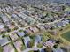 The aerial view shows the home's proximity to the lake, highlighting the appeal of the surrounding area at 7812 Se 167Th Mistwood Ln, The Villages, FL 32162