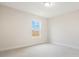 Bedroom featuring neutral carpeting, and a large window providing natural light at 9729 Lost Creek Dr, Winter Garden, FL 34787