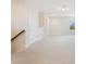 Upstairs living area with neutral carpet, recessed lighting, and bright natural light from the window at 9729 Lost Creek Dr, Winter Garden, FL 34787
