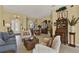 Open living space showcasing elegant decor and a view into the front entryway at 995 Hidden Blf, Clermont, FL 34711