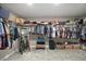 Spacious walk-in closet with plenty of storage space and room for organization at 10177 Spring Lake Dr, Clermont, FL 34711