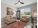 Comfortable home office with plush seating and a large window at 10177 Spring Lake Dr, Clermont, FL 34711