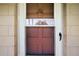 Front door with a screen door with a window and a door knob on the right side at 1100 E Caroline St # 218, Tavares, FL 32778