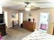 This spacious bedroom features an attached bathroom and plenty of natural light at 1108 Ben Hope Dr, Leesburg, FL 34788