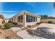 View of the sun room on the home's exterior at 1202 San Bernardo Rd, The Villages, FL 32162