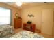 Comfortable bedroom with two twin beds and a decorative shelf at 1215 Eagle Ridge Dr, The Villages, FL 32162