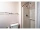 Bathroom featuring a toilet and a shower at 12418 Clubhouse Ct, Tavares, FL 32778