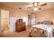 Bedroom featuring a bed, closet, and dresser at 12418 Clubhouse Ct, Tavares, FL 32778