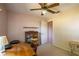 Bedroom featuring a ceiling fan, closet, and desk at 12418 Clubhouse Ct, Tavares, FL 32778