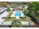 Community pool and shuffleboard courts, perfect for outdoor fun at 12418 Clubhouse Ct, Tavares, FL 32778