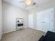 Bedroom featuring a ceiling fan, ample space and storage at 12919 Freeman St, Windermere, FL 34786