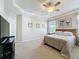 Comfortable bedroom featuring a ceiling fan, neutral tones, and a relaxing ambiance at 12919 Freeman St, Windermere, FL 34786