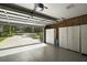 Spacious garage with ample storage and easy access with an automatic door opener at 1322 Howard Rd, Leesburg, FL 34748