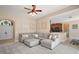 Cozy living area with neutral tones, a sectional sofa, and an open layout at 13800 Wellington Ln, Grand Island, FL 32735