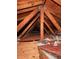 Spacious attic with wooden framework and flooring at 15912 Lake Orienta Ct, Clermont, FL 34711