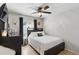 Cozy bedroom features a ceiling fan and natural light at 15912 Lake Orienta Ct, Clermont, FL 34711