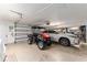 Spacious garage features room for two vehicles and ample storage at 16011 Acorn Cir, Tavares, FL 32778